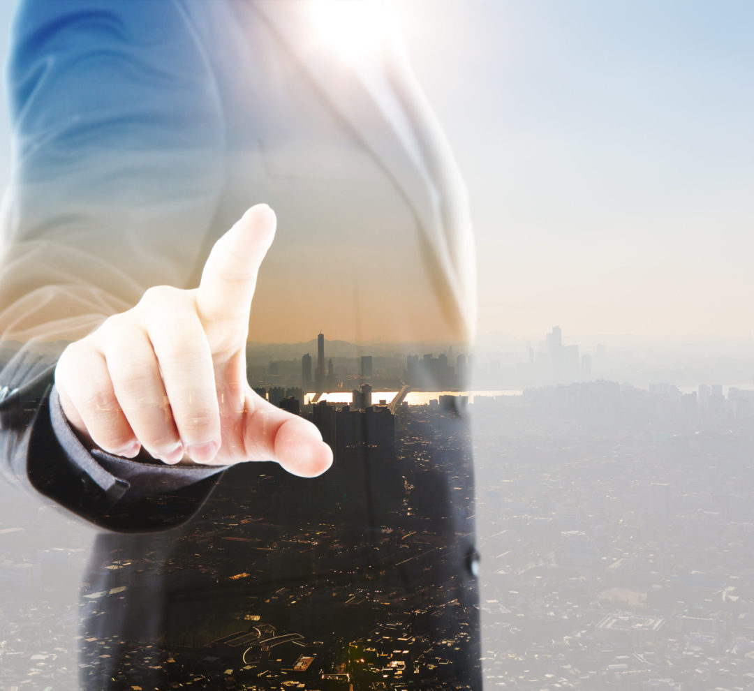 Abstract Double exposure of Business man touching an imaginary screen against white background